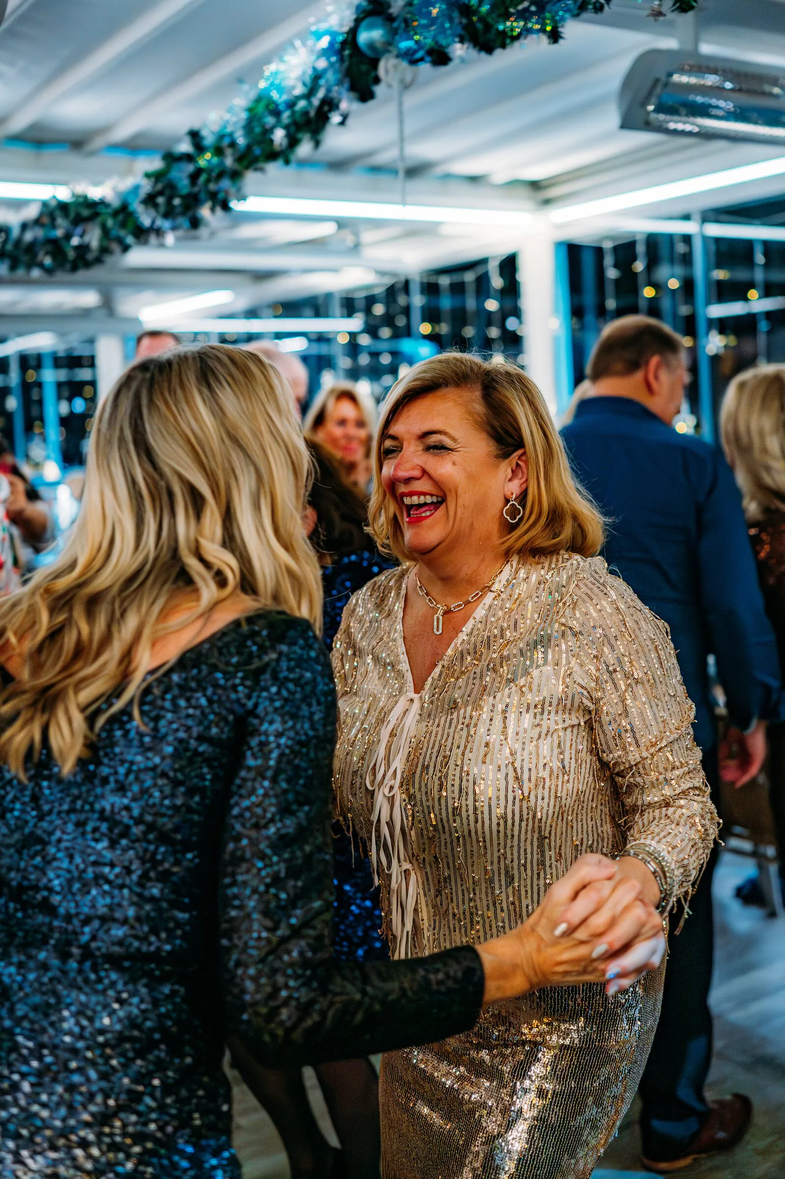 Two guests dancing at a Christmas party at Banana Wharf
