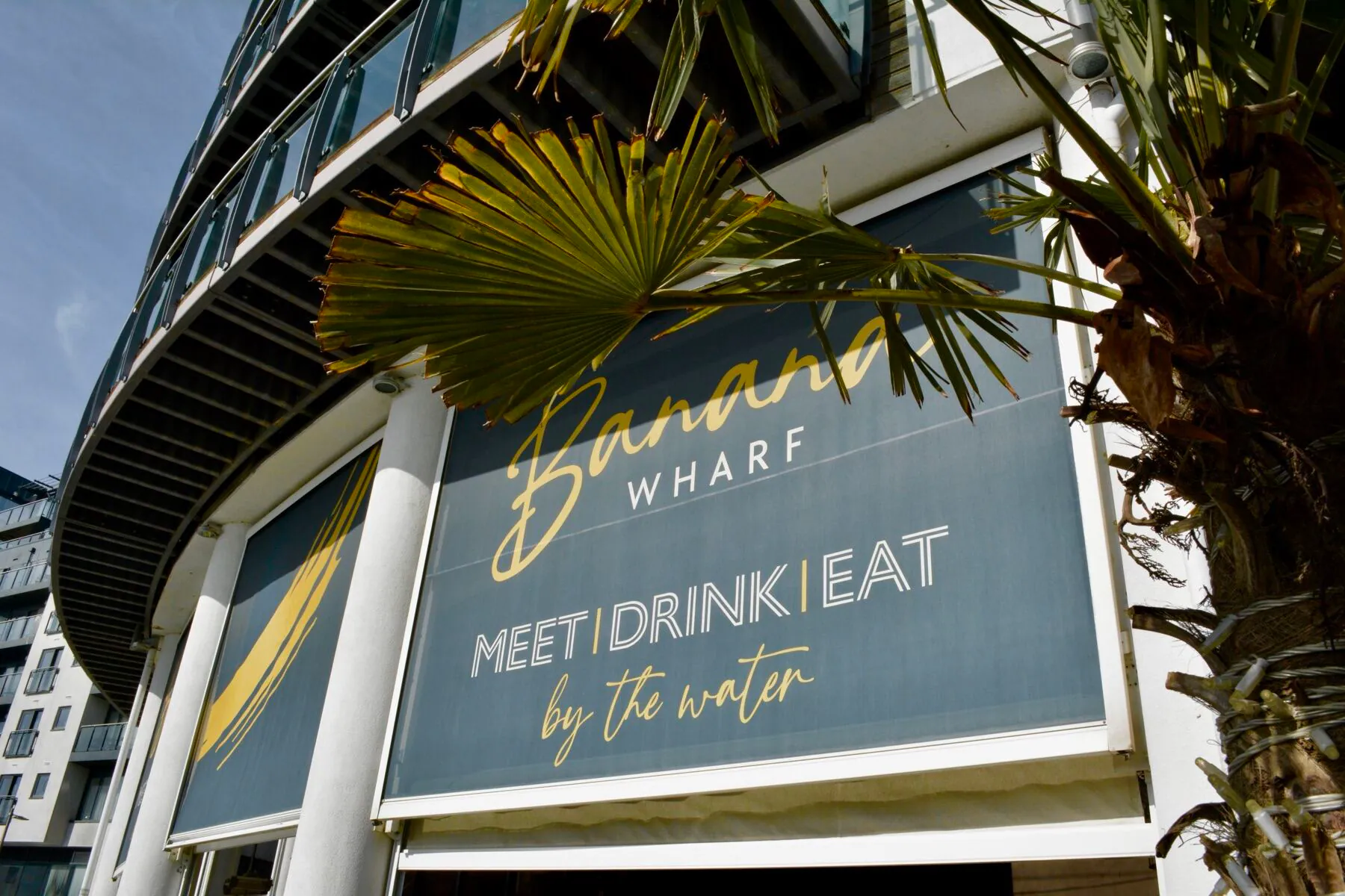 Banana Wharf signage at Ocean Village, MEET DRINK EAT by the water